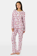 The Alpha Phi Monkey Pajamas by Roller Rabbit are a long-sleeve pajama set crafted from soft Pima cotton, featuring a red and gray cartoon animal print on a white background, with a Henley top and matching pants.