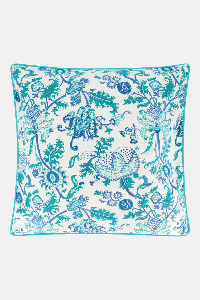 The Amanda Decorative Pillow by Roller Rabbit features an intricate blue and teal floral and bird hand-blocked print on white 100 cotton, finished with blue piping along the edges.