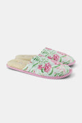 The Roller Rabbit Camellia Block Quilted Slippers are cozy, backless cotton slippers featuring a pink and green floral pattern on a light background, pink and white striped trim, and a soft cream-colored lining.