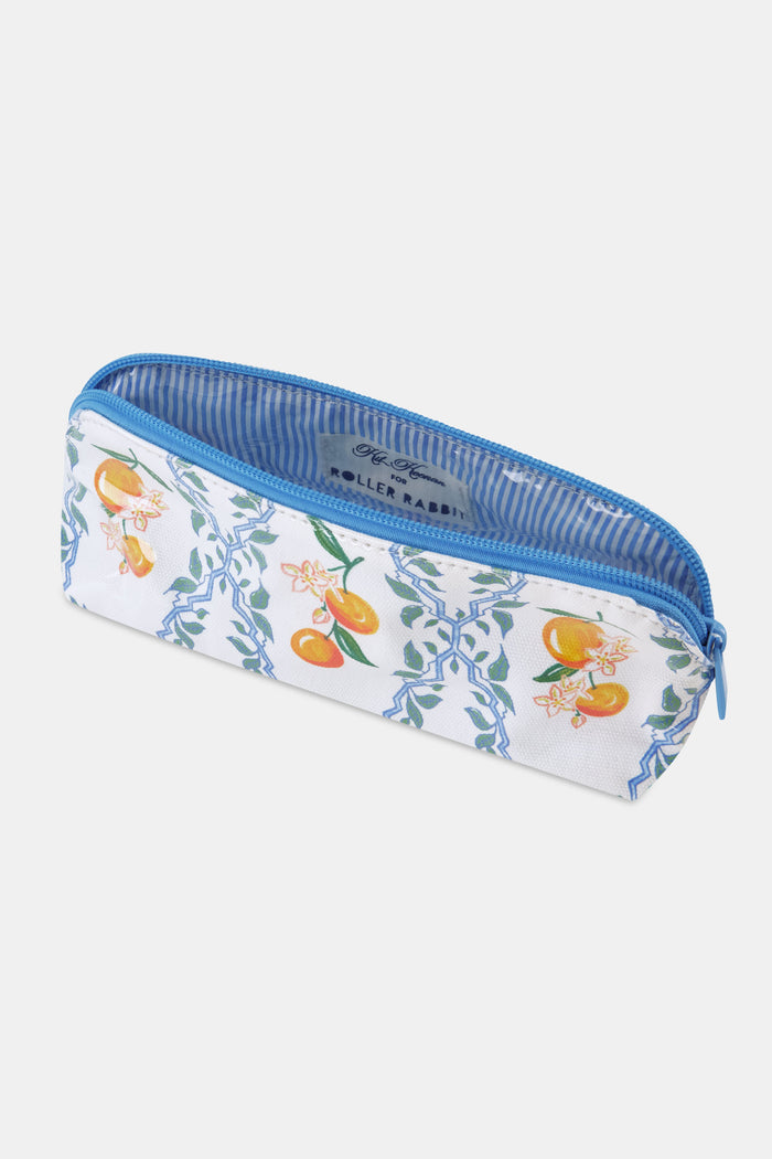 The Clementine Trellis Makeup Bag by Roller Rabbit is a zippered, water-resistant cotton canvas bag with a blue zipper and a white background featuring blue geometric lines, green leaves, orange fruits, and white flowers.