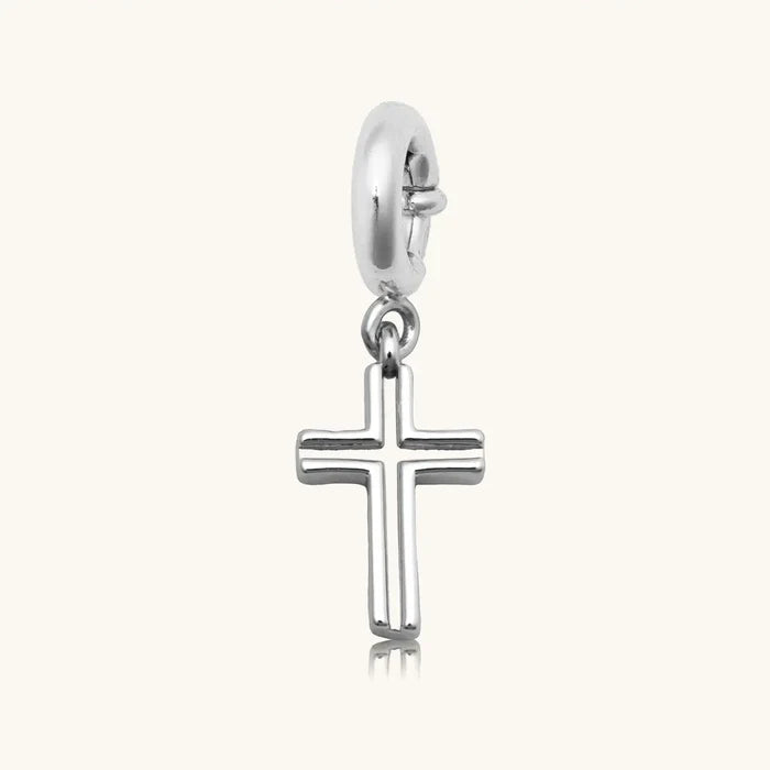 Silver open-cut cross charm pendant with a spring-ring clasp, shown on a white background.