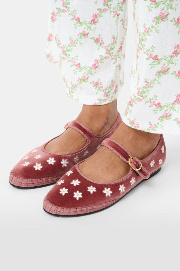 The FLABELUS Daisy Embroidery Mary Jane is a dusty pink velvet slipper with a strap and buckle, featuring small white floral embroidery along the side, shown against a plain white background.