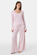 The Daisy Heart Stripe Boden Pant by Roller Rabbit features a wide-leg silhouette with a white base, adorned with vertical pink floral and dotted stripes. Designed for comfort, these pajama pants have an elastic waistband and are crafted from soft Pima cotton for a luxurious feel.