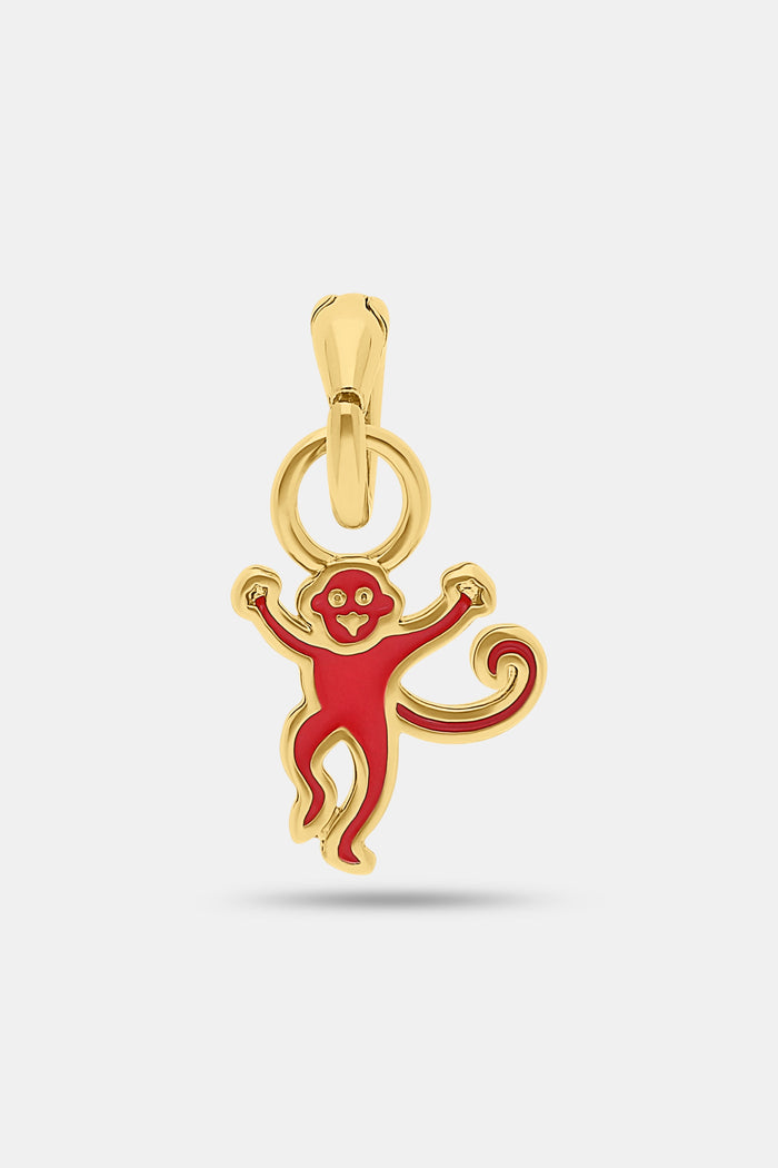 The MADISON 501 Enamel Monkey Charm features a smiling red monkey with raised arms and a curled tail, outlined in 14K gold-plated brass—perfect as festive jewelry.