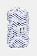 The Roller Rabbit Hearts Sleepover Bag is a large white bag with small blue hearts, a drawstring top, an external zippered pocket with two blue exclamation points, and "sleepover" printed below. Ideal for carrying kids' sleeping bags.