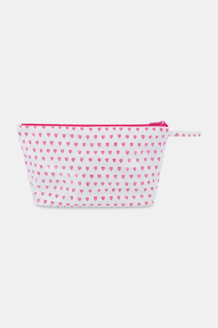 The Hearts Toiletry Case by Roller Rabbit is a white, water-resistant zip pouch with a pink zipper and handle, adorned with small pink hearts—perfect for organizing your travel essentials.