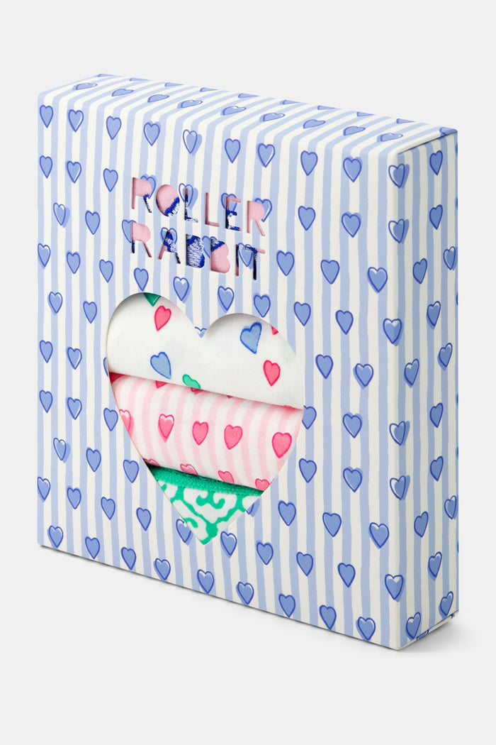 Roller Rabbit Icons Bikini 4 Pack features four girls' panties: solid pink with butterfly, white with colorful dots and blue trim, pink with hearts, and green geometric modal with lace trim.