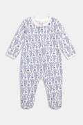 The Roller Rabbit Infant Monkey Zipper Footie is a white long-sleeve baby pajama featuring a playful monkey print, soft Pima Cotton fabric, a convenient front zipper closure, and a comfortable round neckline.
