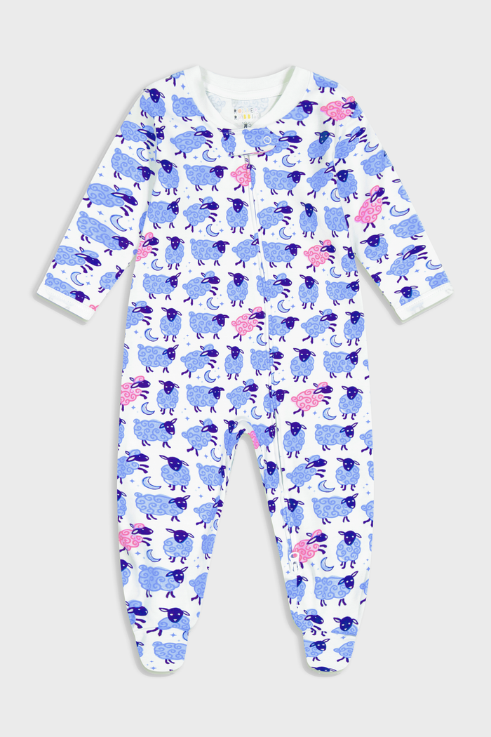 The Roller Rabbit Infant Sammy The Sheep Zipper Footie, shown on a plain light background, features a blue and white pattern with playful blue and pink sea creatures, long sleeves, two-way front zipper, and fold-over mitten cuffs.