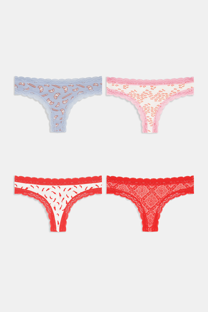 The Roller Rabbit Jet Set Thong 4 Pack features four lace-trimmed thongs—blue with hearts, pink with red lips, white with lips, and solid red—arranged in two rows on a white background.