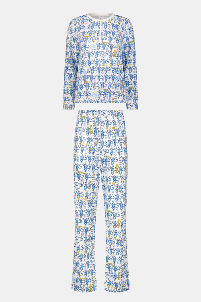 The Roller Rabbit Kappa Kappa Gamma Monkey Pajamas are a two-piece set with long sleeves and pants, showcasing an all-over blue and yellow monkey cartoon print on a white background, displayed on a flat white backdrop.