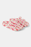 The Kids Monkey Pool Slides by Roller Rabbit feature playful pink and red swirls with abstract monkey prints on a white background, set against a plain white surface.