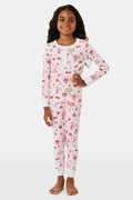 A girl wearing Roller Rabbit Kids Sweater Weather Pajamas stands barefoot, smiling, against a plain white background.