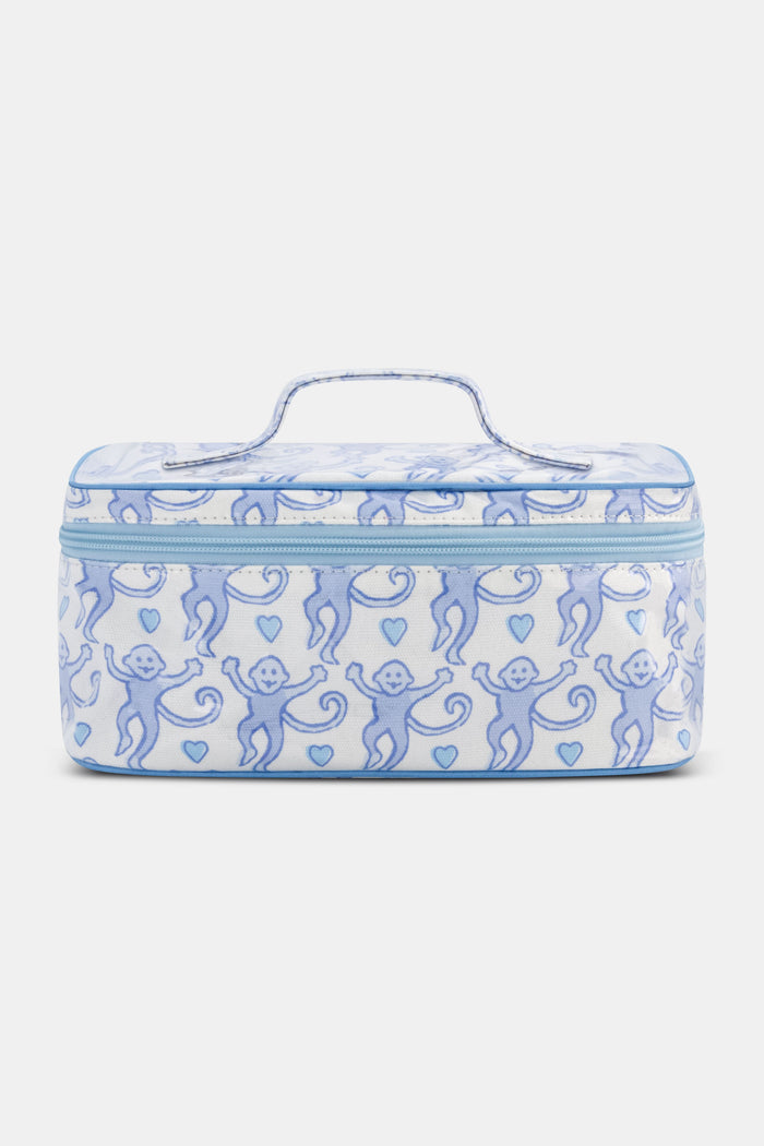 The Roller Rabbit Lovely Monkey Carry All Case is a rectangular, water-resistant cosmetic bag with a light blue zipper and handle, featuring playful blue monkeys and hearts on white—a perfect travel companion for your essentials.