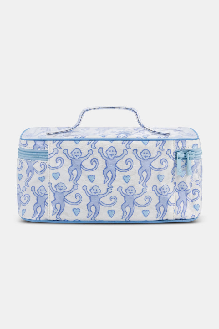 The Roller Rabbit Lovely Monkey Carry All Case is a rectangular, water-resistant cosmetic bag with a light blue zipper and handle, featuring playful blue monkeys and hearts on white—a perfect travel companion for your essentials.