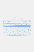 The Roller Rabbit Mini Monkey Blossom Carry All Case is a rectangular white fabric toiletry bag featuring a blue floral and monkey pattern, blue trim, a zip-around top closure, and a clear plastic handle on the lid.