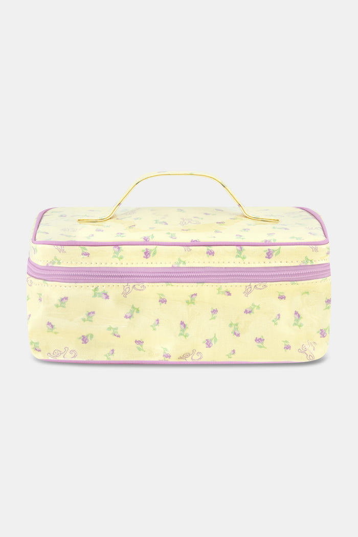 The Roller Rabbit Mini Monkey Blossom Carry All Case is a rectangular yellow toiletry bag featuring a pink floral pattern, a purple zipper, and a yellow handle on top. Displayed against a plain white background, this stylish travel bag is perfect for organizing your essentials.