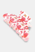 The Roller Rabbit Monkey Claw Clip is a butterfly-shaped hair accessory with a white base, decorated with playful pink monkeys holding yellow leaves.
