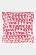 The Roller Rabbit Monkey Decorative Pillow features a white cotton cover with playful pink monkey patterns and is accented with pink piping for a charming finish.