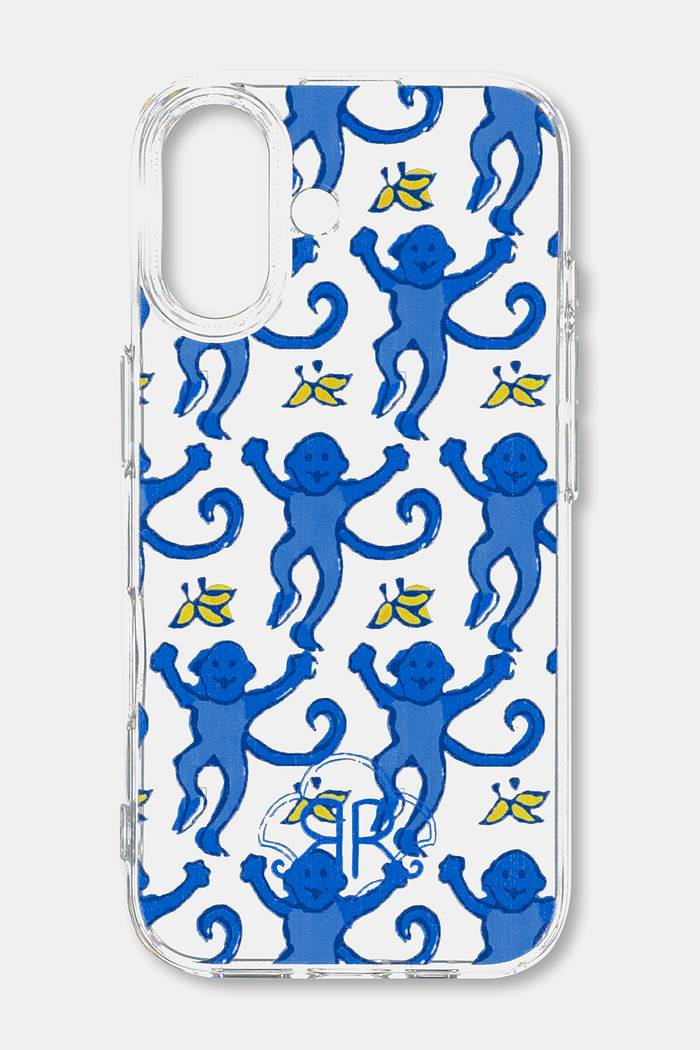 The Monkey iPhone Case by Roller Rabbit features a playful, cartoon pattern of blue monkeys and yellow bananas on a white background—perfect for fans looking to protect their phone in fun style.