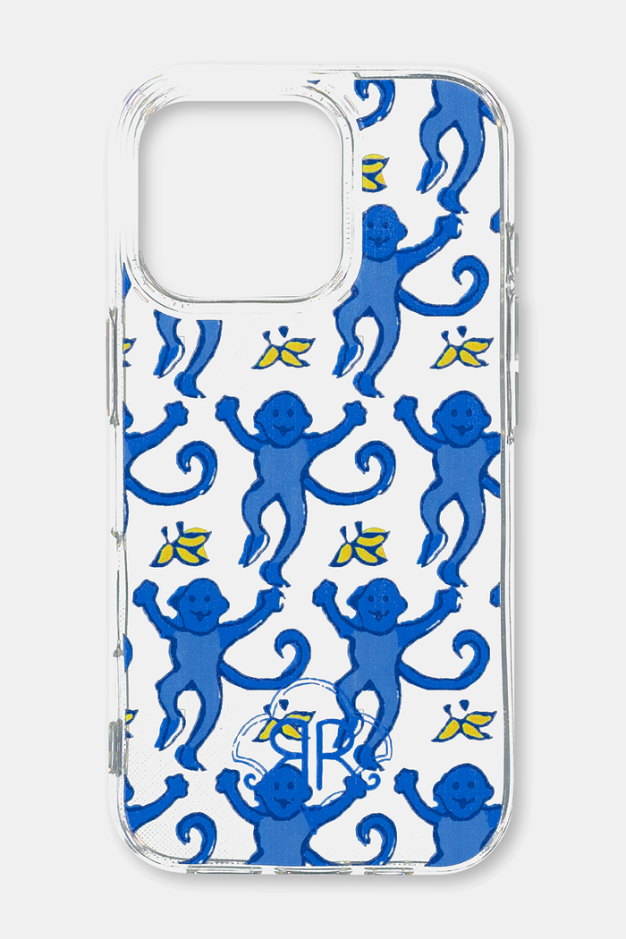 The Monkey iPhone Case by Roller Rabbit features a playful, cartoon pattern of blue monkeys and yellow bananas on a white background—perfect for fans looking to protect their phone in fun style.