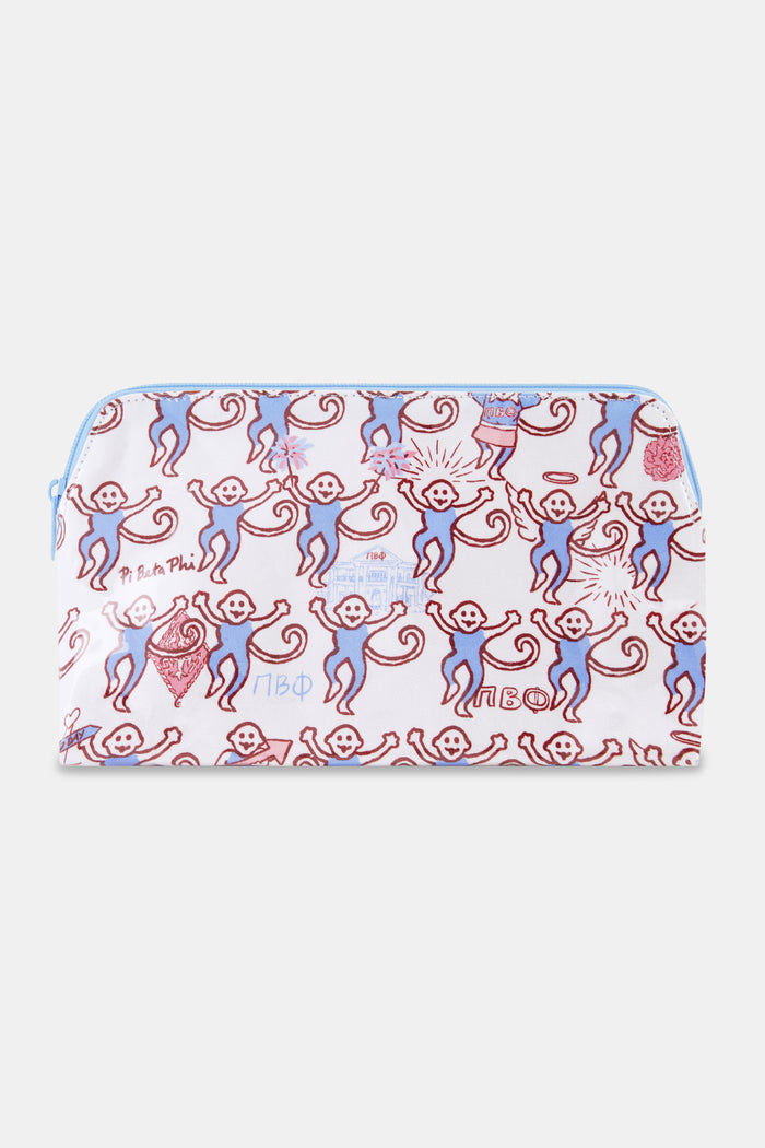 The Pi Beta Phi Monkey Makeup Bag by Roller Rabbit is a rectangular makeup bag with a zipper, adorned with a playful pattern of red and blue monkeys and Cyrillic text on a light background.