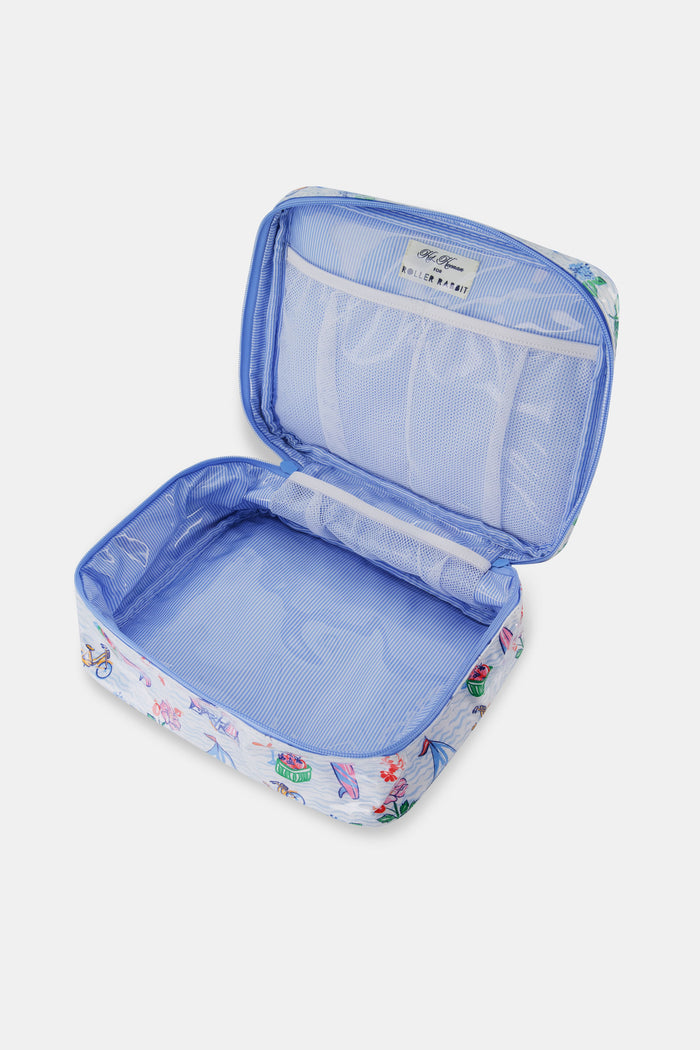 The Roller Rabbit Summer Club Carry All Case is a rectangular cotton canvas bag with a handle, featuring colorful crabs, flowers, surfboards, bicycles, cupcakes, and a sailboat on a light blue wavy background.
