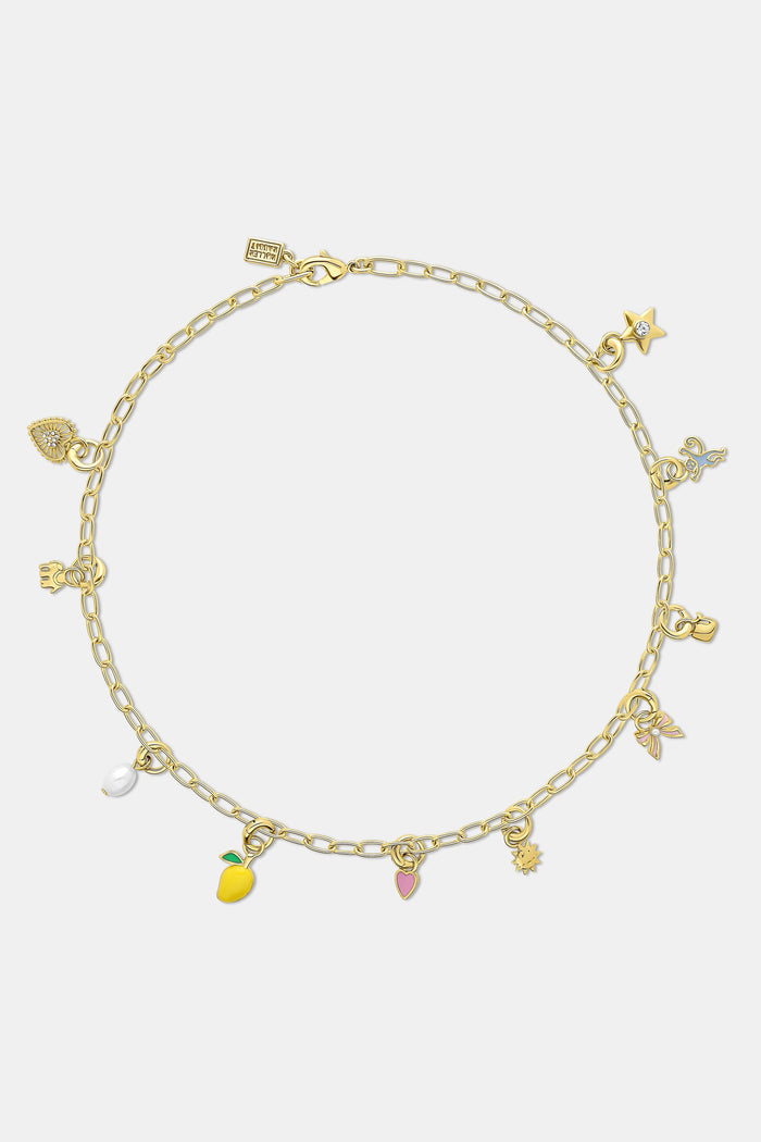 The Roller Rabbit Sun Charm features a 14K gold sun-shaped pendant with a smiling face and radiant spikes, attached to a circular gold loop—perfect for your favorite charm bar.
