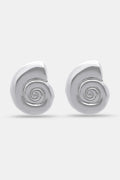 Roller Rabbit Swirl Stud Earrings: shiny silver studs shaped like abstract shells with a raised spiral design in the center, shown on a plain light gray background.